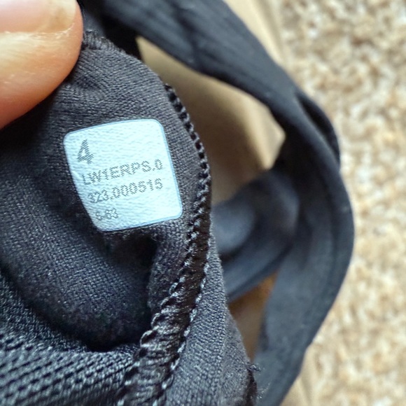 Lululemon Ribbed Nulu Asymmetrical Yoga Tank
Top in Black size 4 - Picture 4 of 6